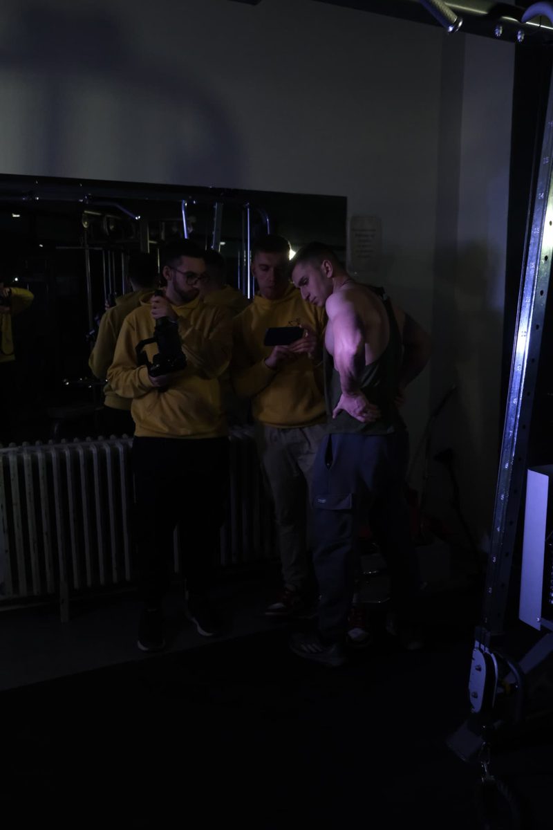 Reviewing a take with the talent in the gym